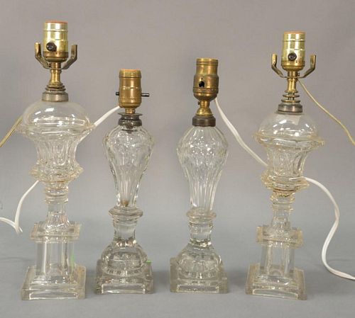 Two pairs of whale oil lamps. ht. 13" & 15 1/2"