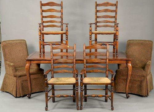Seven piece lot include dining table, four ladderback armchairs and two upholstered armchairs. ht. 30", top: 36" x 78"