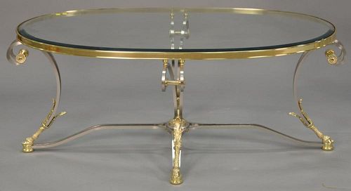 Contemporary glass top oval coffee table. ht. 21", top: 29" x 50"