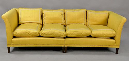 Yellow two-part sofa.