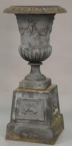 Pair of large iron two part urns on square bases, ht. 62", dia. 30".