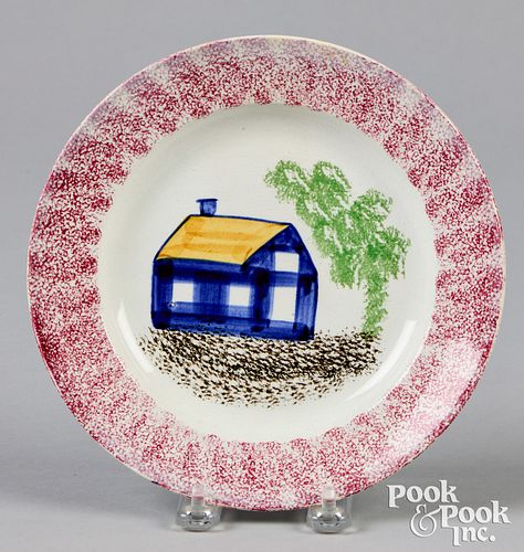 Red spatter plate with blue schoolhouse