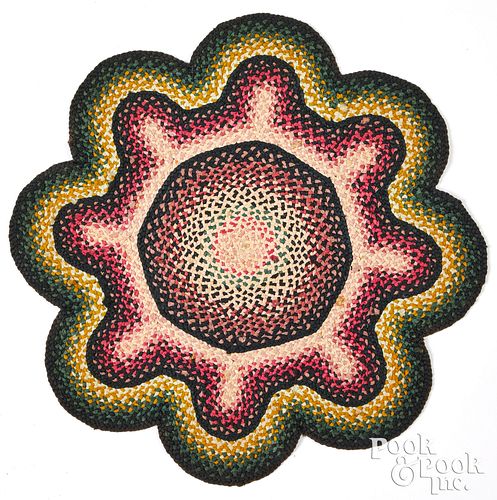 Vibrant Pennsylvania braided table mat, 19th c.