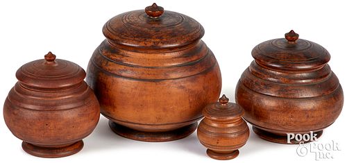 Four graduated Peaseware turned canisters, 19th c.