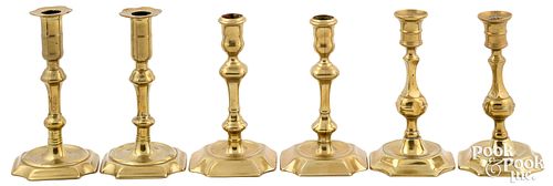 Three pair of English Queen Anne candlesticks