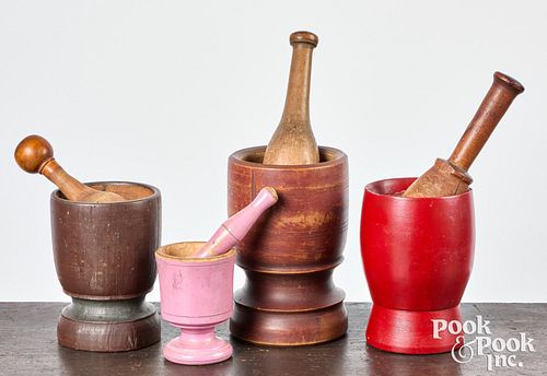 Four turned and painted mortar and pestles, 19th c