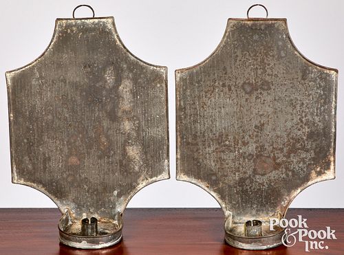 Pair of tin candle sconces, 19th c.