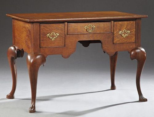 English Carved Oak Desk, early 20th c., the rectan