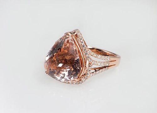 Lady's 14K Rose Gold Dinner Ring, with an 11.23 ca