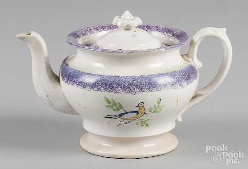 Purple spatter teapot with dove decoration, 5 1/2'' h.