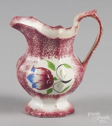 Red spatter creamer with tulip decoration, 5 5/8'' h.