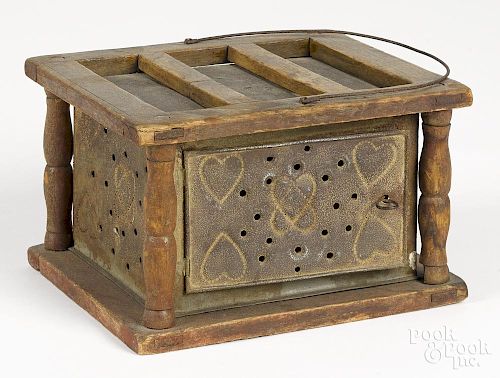 Punched tin footwarmer, 19th c., with heart decoration, 5 3/4'' h., 9'' w.