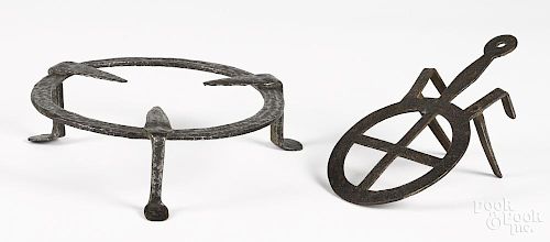 Two wrought iron trivets, 19th c., 8 3/4'' x 5'' and 9'' dia.