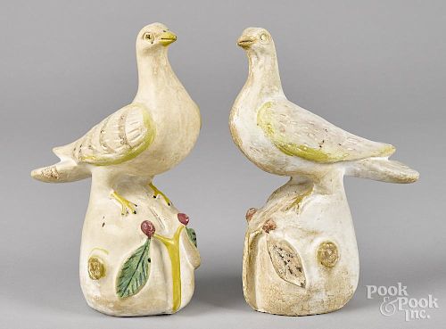 Two Pennsylvania chalkware pigeons, late 19th c., 10 3/4'' h. and 11'' h.