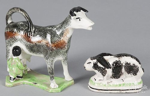 Spatter cow creamer, 20th c., 5 1/4'' h., together with a Staffordshire rabbit, 2 1/2'' h.