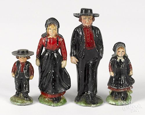 Four-piece painted cast metal Amish family, 5 3/4'' h.
