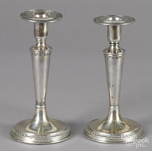 Pair of sterling silver weighted candlesticks, 7 1/2'' h.