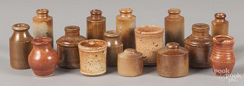 Fifteen miniature stoneware bottles and crocks, tallest - 3 5/8''.