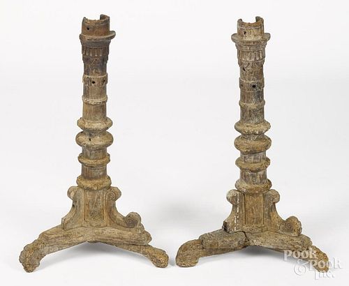 Pair of Continental ecclesiastical wooden candlesticks, 18th c., 28'' h.