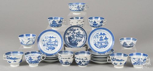 Thirty-seven Chinese export porcelain Canton cups and saucers, 19th/early 20th c.