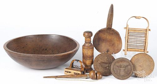 Woodenware, 19th c., to include butter prints, a scoop, a bowl, etc.