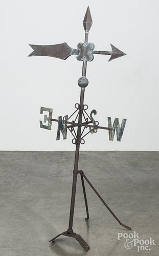 Copper bannerette weathervane, 20th c., mounted on an early iron stand with directionals, 53'' h.