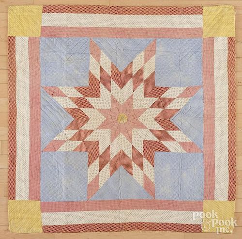 Pieced lone star crib quilt, early 20th c., 41'' x 41''.