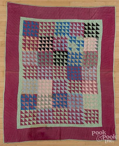 Flying geese variant quilt, early 20th c., 67'' x 55''.