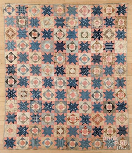 Pieced diamond and star in block quilt, late 19th c., 66'' x 79''.