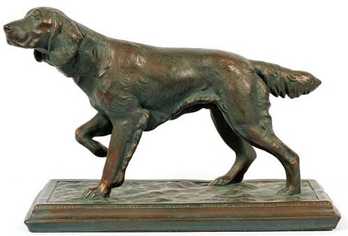 PATINATED METAL FIGURE OF A HUNTING DOG