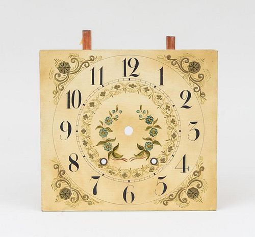 Two Painted Wood Clock Faces and a Brass Fire Fender