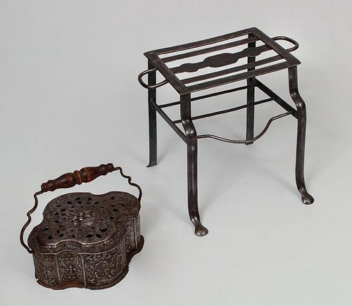 English Steel and Wrought-Iron Footman and a Continental Pierced Tin Warming Box