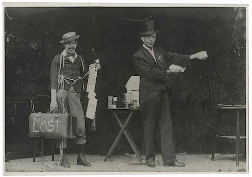 Cardini (Richard Valentine Pitchford). Candid Performance Snapshot. N.p., ca. 1920s. Young Cardini is shown beside a clown, various props, tables, and