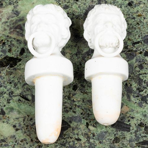 Pair of Continental Porcelain Bottle Stoppers