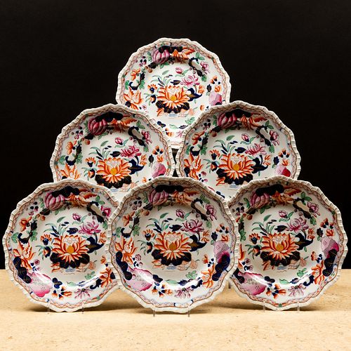Set of Twenty-Two English Ironstone Dinner Plates in a Lotus Pattern
