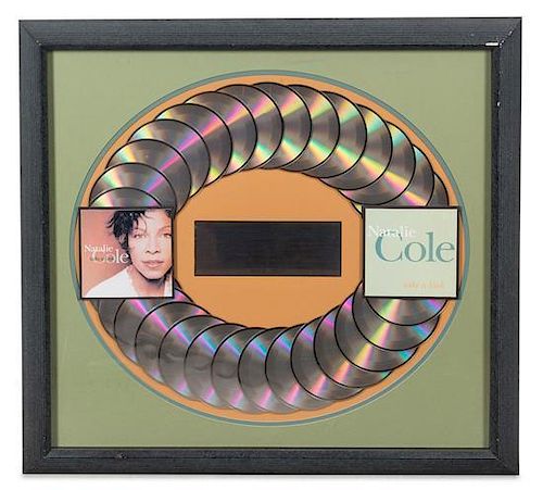 A Natalie Cole: Take a Look Presentation Album and Plaque 24 1/2 x 26 inches.