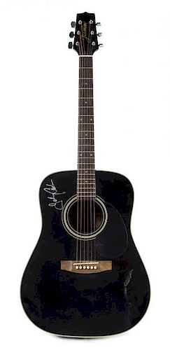 A Johnny Cash Autographed Guitar Length 41 1/2 inches.