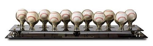A Collection of Eleven 500 Home Run Club Autographed Baseballs Height of display case 9 inches x width 36 1/2 x depth 10 inches.