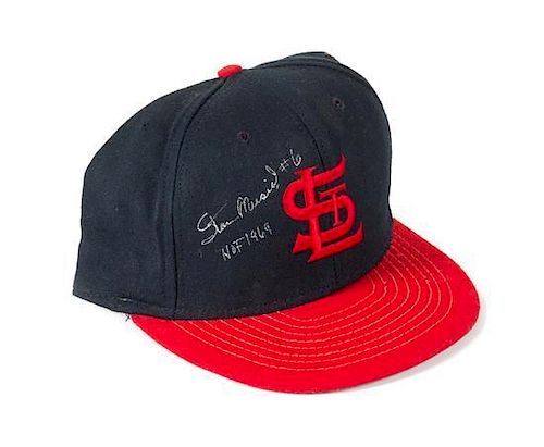A Stan Musial Autographed Baseball Hat Height of display case 6 1/2 x width 9 x depth 10 1/2 inches.