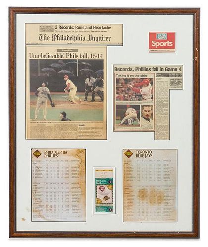 A 1993 World Series Framed Newspaper, Lineup Card and Ticket Stub 31 1/2 25 1/2 inches overall.