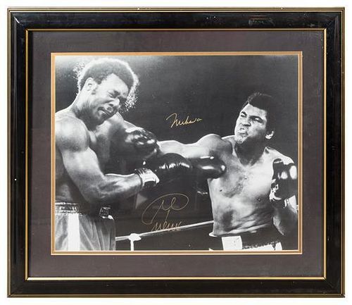 A Muhammad Ali & George Foreman Autographed Photo 23 x 27 inches overall.