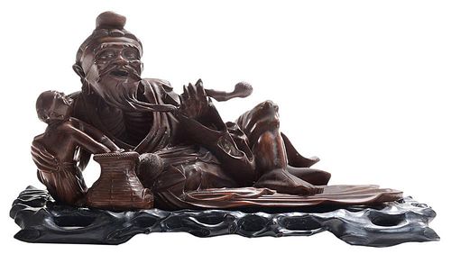 Finely Carved Hardwood Reclining