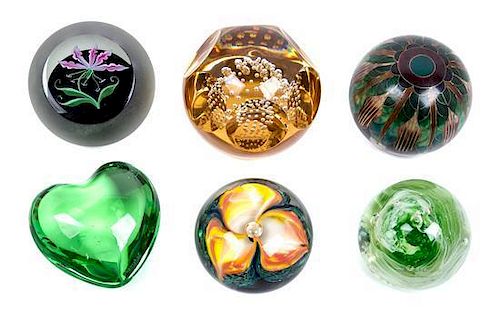 * A Collection of Studio Glass Paperweights Diameter of largest 3 1/2 inches.
