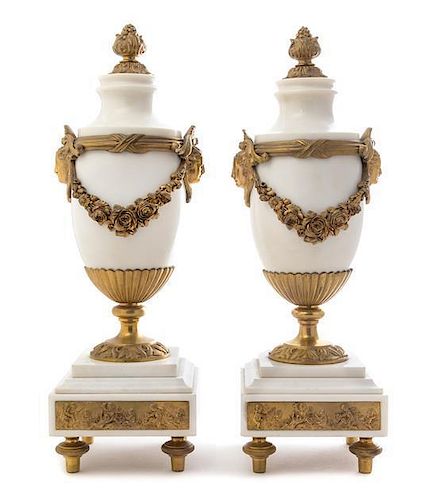 * A Pair of Gilt Bronze Mounted White Marble Urns Height 17 1/4 inches.
