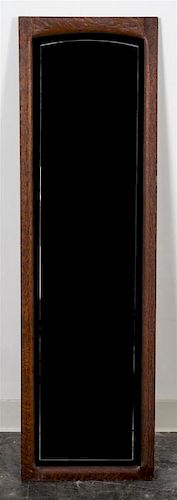 An Oak Framed Wall Mirror Height 48 1/2 inches.