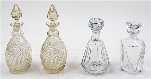 * Four Crystal Decanters Height of tallest 11 3/4 inches.