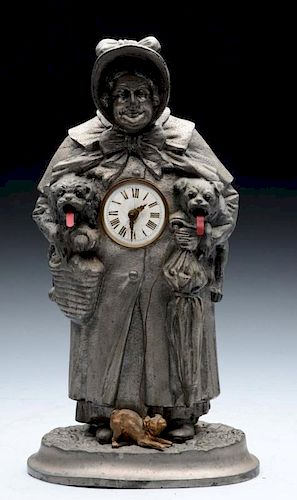 Continental Animated Clock of Woman Holding Dogs.