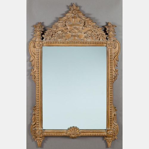 A Louis XV Style Carved Hardwood Mirror, 20th Century.