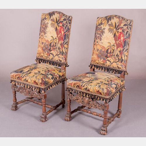 A Pair of Charles II Style Carved Walnut Side Chairs with Tapestry Upholstery