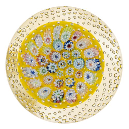 JOHN DEACONS (SCOTTISH, B. 1950) CLOSE-PACK MILLEFIORI AND CONTROLLED BUBBLE PAPERWEIGHT,